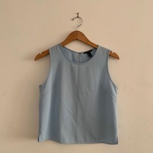 Blue sleeveless blouse